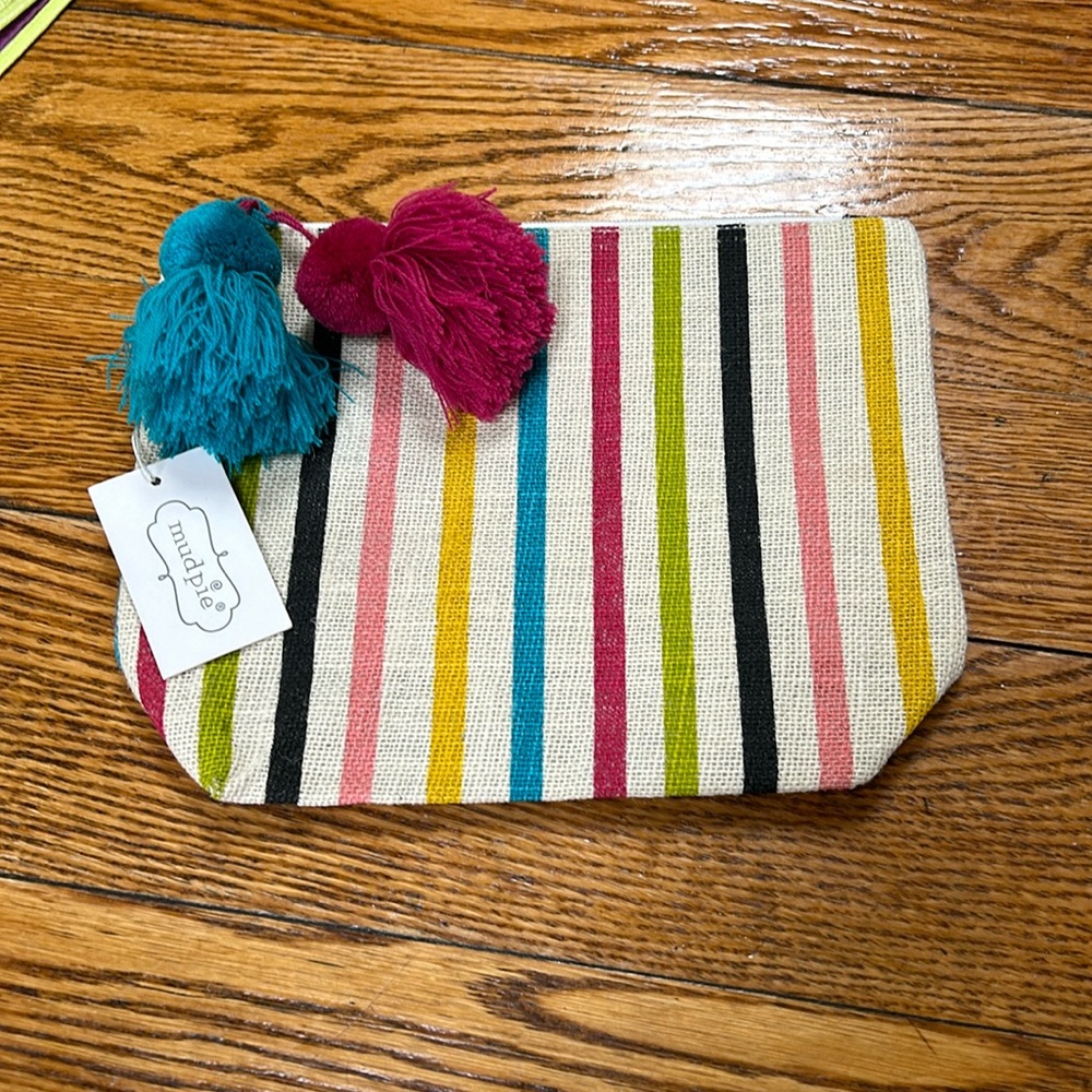 Mud Pie new with tag striped jute bag.  Green, pink, black gold. Pompom tassles.